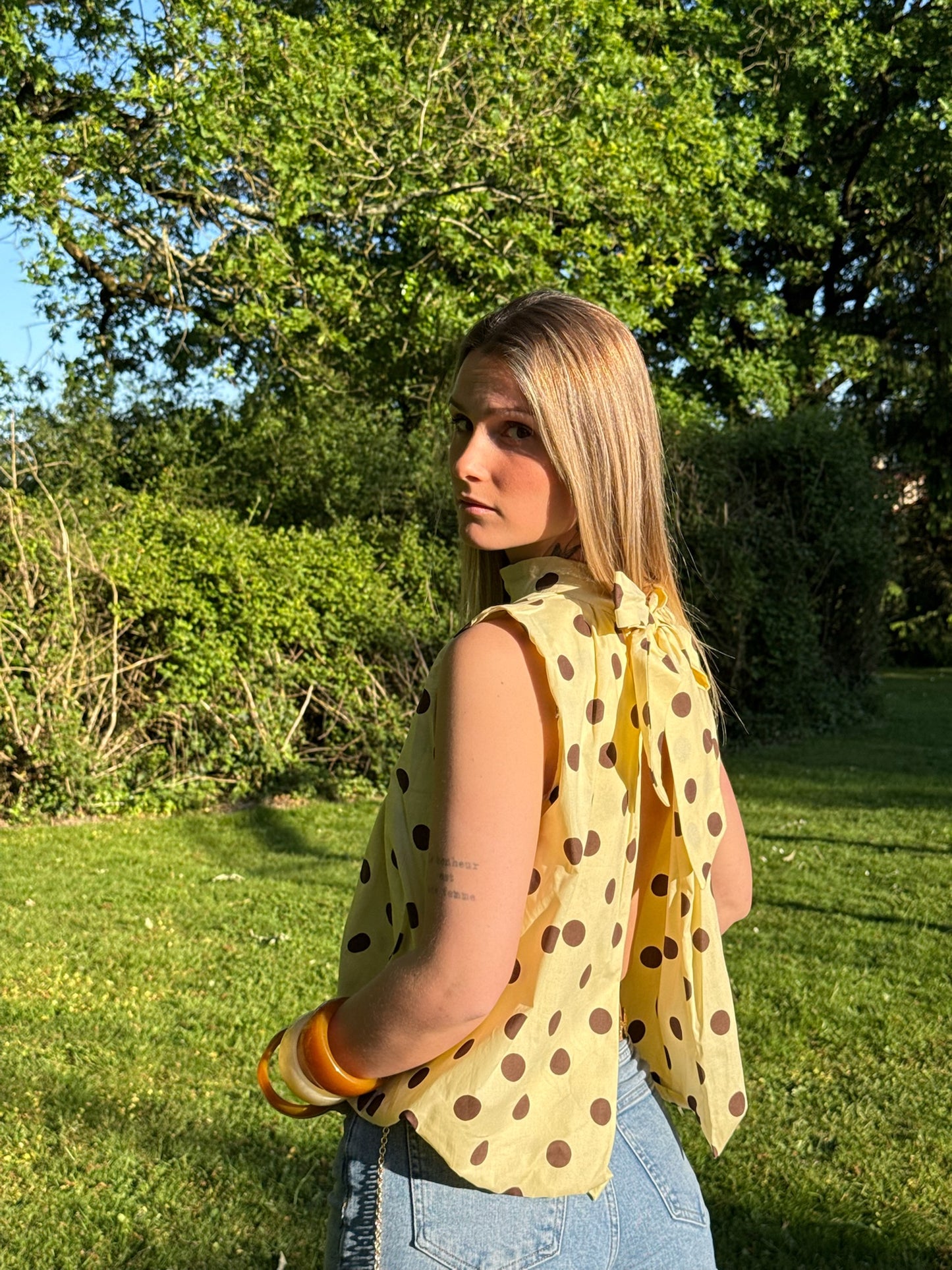 Blouse sans manches à pois