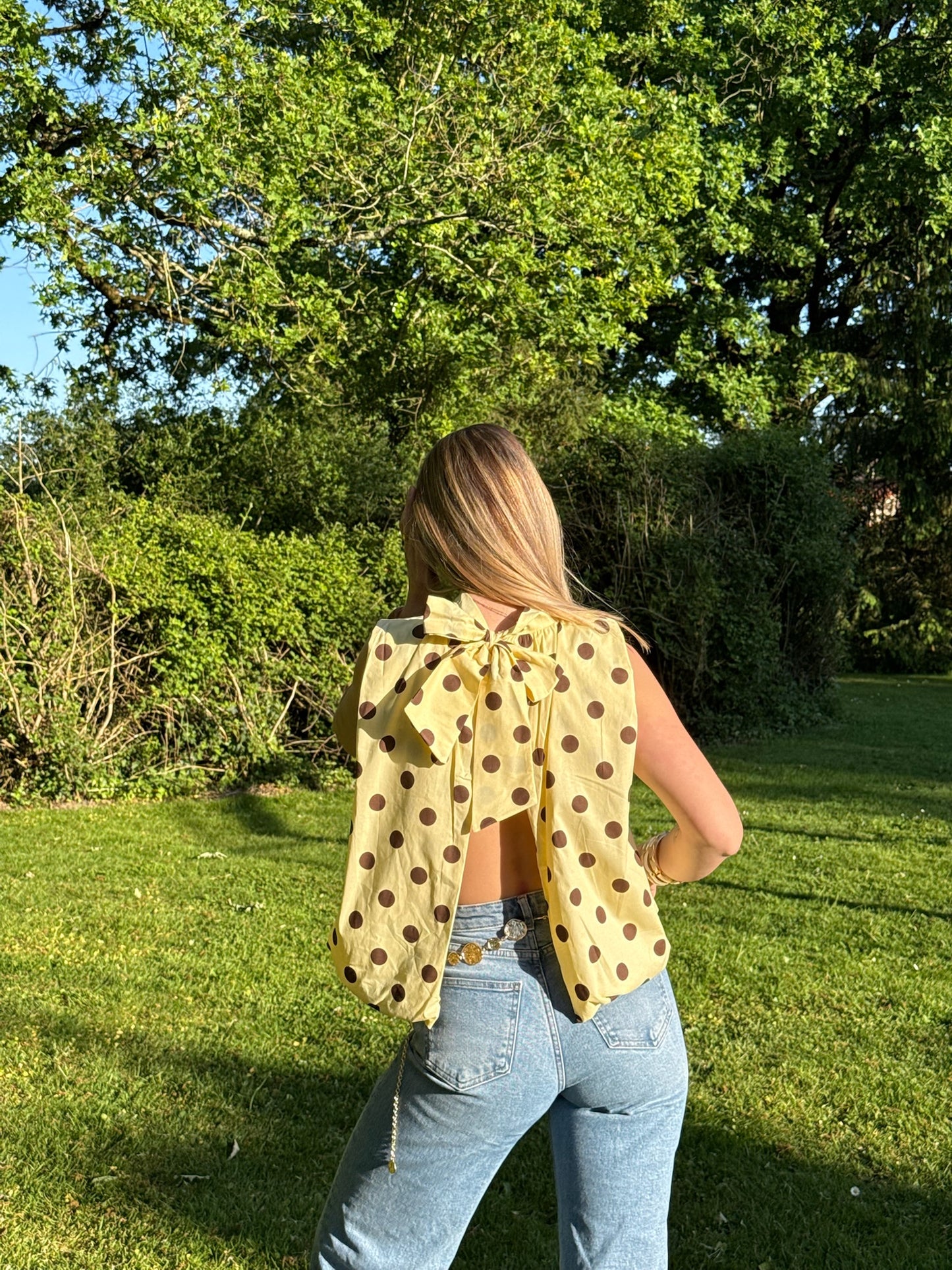 Blouse sans manches à pois